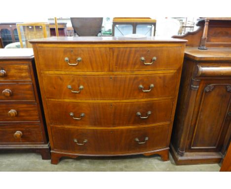 An Edward VII inlaid mahogany bow front chest of drawers 