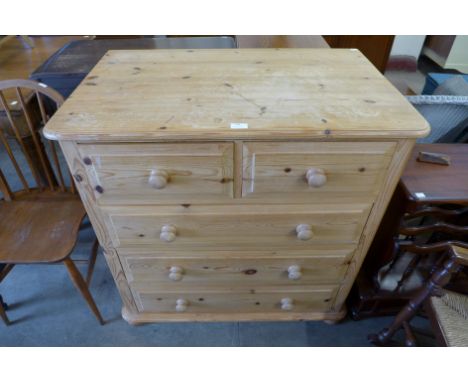 A pine chest of drawers 