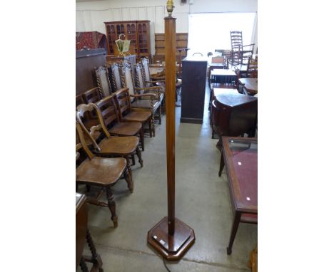 An Art Deco walnut floor standing lamp 