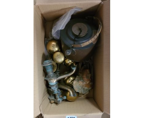 A box containing a small quantity of assorted metalware including GWS&amp;S kettle, taps, cast mask door knocker, etc.