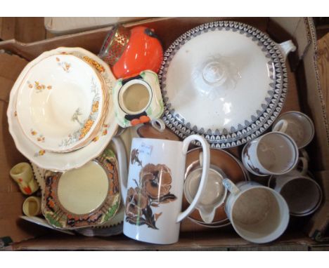 A box containing a quantity of ceramics and glassware including Susie Cooper, bone china part coffee set, two novelty fox pat