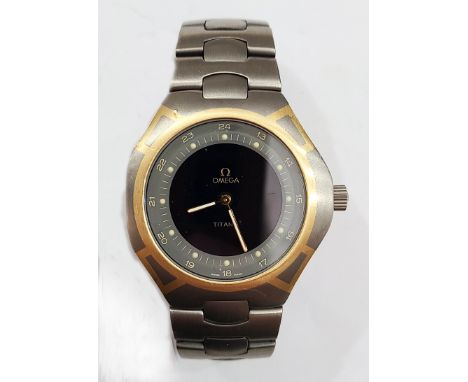 An Omega Titane Seamaster Polaris titanium and goldtone highlighted gentleman's wristwatch with black centered grey dial, on 