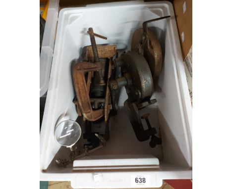 A Dunlop Junior foot pump, small tabletop magnifier, G-clamp and a grinding wheel