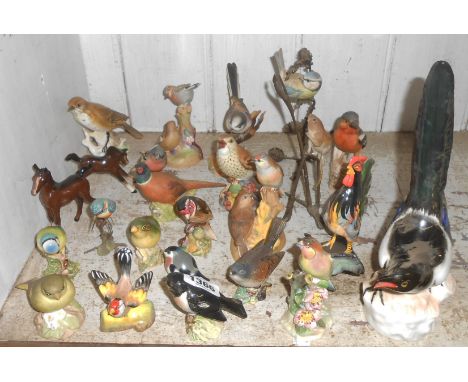 A large quantity of ceramic birds including, Royal Worcester, Beswick, Adderley, Babbacombe, etc.