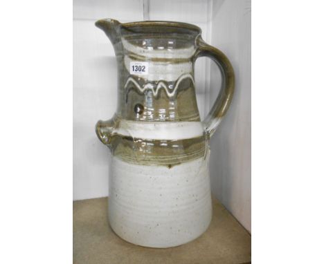 A large Michael Casson Studio Pottery jug with painted decoration on a grey glaze ground