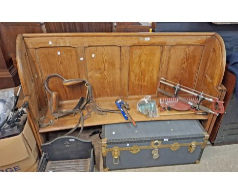 A 1.56m late Victorian pitch pine pew with slightly curved panelled back and solid seat