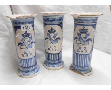 Three antique maiolica vases of cylindrical form with blue hand painted armorial decoration - a/f