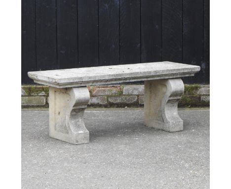 A reconstituted stone garden bench, 107cm