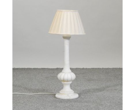 A white marble table lamp and shade, 74cm high overall