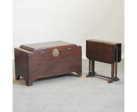 An eastern camphor wood trunk, 101cm, together with an oak sutherland table (2)