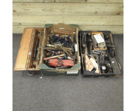 A collection of planes and other woodworking tools