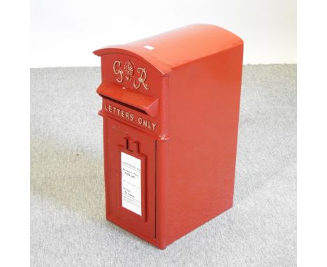A GPO style red painted post box, 56cm high