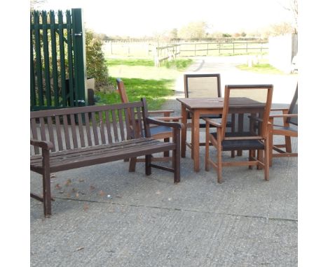 A teak garden bench, 151cm, together with a teak garden table and four chairs