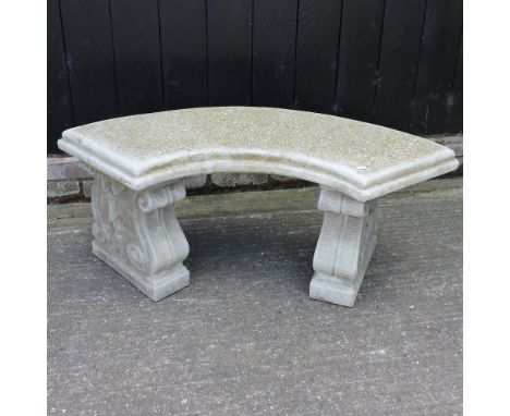 A reconstituted stone curved garden bench, 106cm