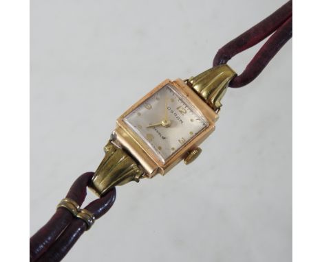 A vintage Osram 18 carat gold cased ladies wristwatch, on a red leather strap