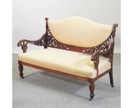 A Victorian aesthetic cream upholstered sofa, 132cm