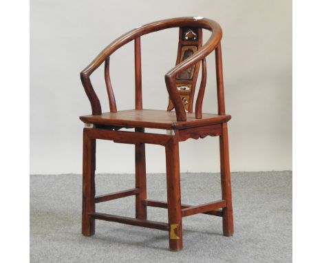 A Chinese hardwood chair, with a horse shoe back
