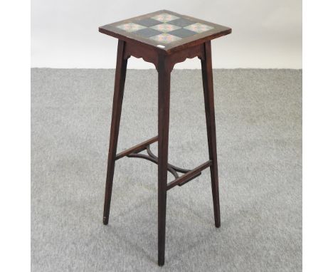 An early 20th century jardiniere stand, inset with Minton tiles, 80cm high