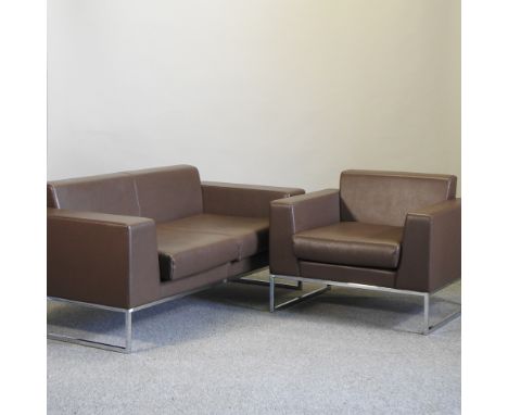 A modern brown leather upholstered Boss Design two seater sofa, 160cm, together with a matching armchair