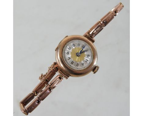 A vintage 9 carat gold ladies wristwatch, on an expandable strap