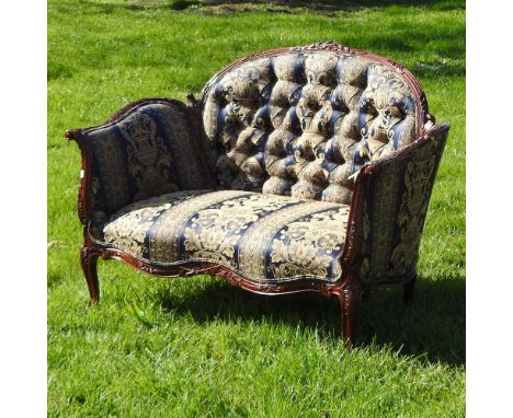 A French style show frame blue and gold upholstered sofa, on cabriole legs, 131cm