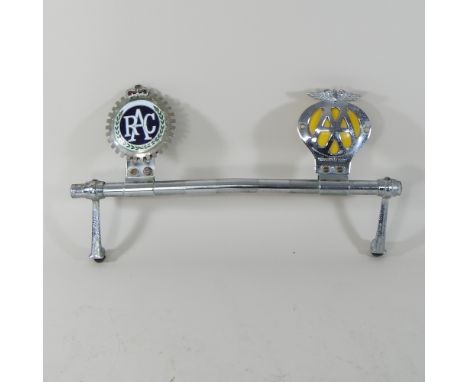 A vintage RAC badge together with a vintage AA badge, mounted on a chrome badge bar, 43cm