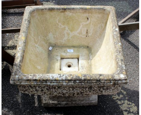 A COMPOSITE STONE SQUARE PLANTER on a stepped square base, 51cm wide