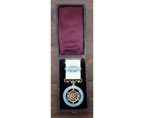 A VICTORIAN SILVER GILT AND ENAMEL DECORATED MASONIC MEDAL 'LODGE OF UNITY' number 183, engraved Ralph Todd to the reverse