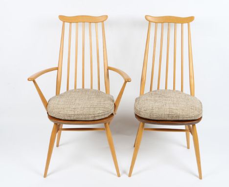THREE ERCOL LIGHT ELM SPINDLEBACK GOLDSMITHS CHAIRS, together with a similar Ercol chair (4)