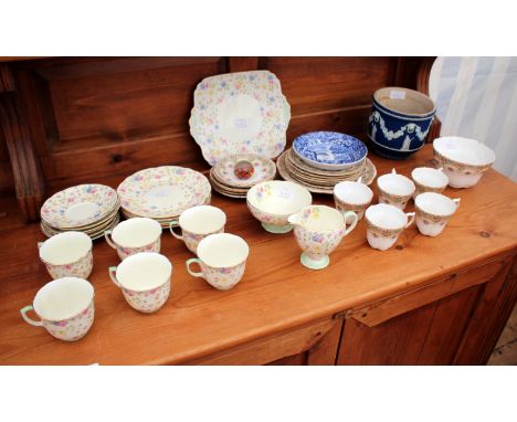 A VICTORIAN PART TEASET decorated with floral designs, marked to the underside Poyntons, England, together with a Foley china