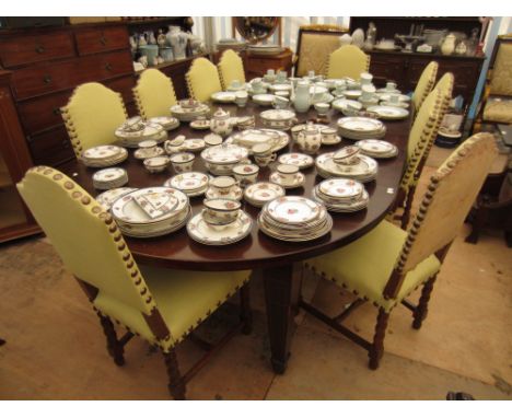 A LARGE WIND OUT MAHOGANY D END DINING TABLE standing on square section tapering legs, inlaid decoration terminating in brass