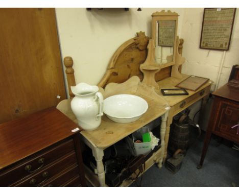 A VICTORIAN PINE DRESSING TABLE with raised mirrored back, single frieze drawer and standing on turned tapering legs 51cm wid