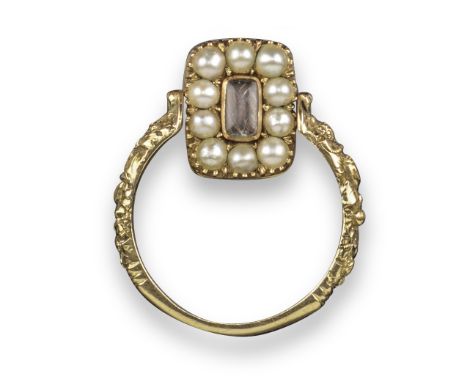 A Regency gold swivel mourning ring, with black enamel plaque reading 'Sacred To A Beloved Father', the reverse with glazed l