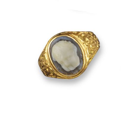 A Roman sardonyx cameo depicting the head of a cherub (possibly Eros), c1st - 2nd century AD, in a 19th century gold ring cha