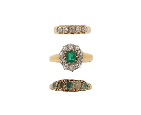 Three gem-set gold rings, including a diamond five-stone ring, size G, an emerald and seed pearl half-hoop ring (one stone mi