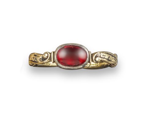 A George II paste-set mourning ring, the oval-shaped red paste is set in silver on gold closed-back setting with engraved dec