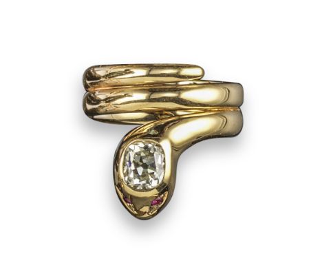 A Victorian diamond-set snake ring, the stylised snake set with an old cushion-cut diamond to its head with ruby eyes, in yel