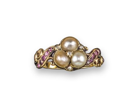 A 19th century gem-set gold ring, set with a trefoil of seed pearls and rose-cut diamonds, with further circular-cut rubies t