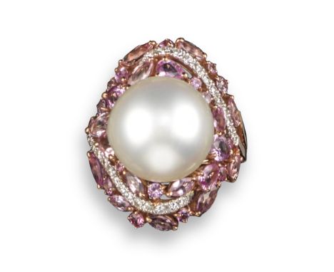 A pink sapphire, cultured pearl and diamond cluster ring, the cultured pearl set within a surround of circular, marquise and 