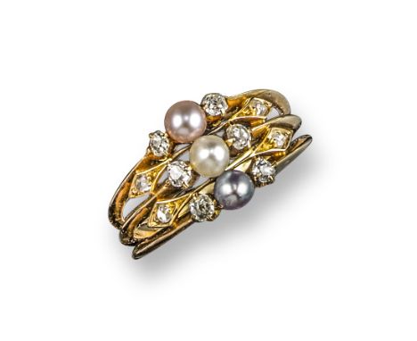 An Edwardian pearl and diamond Harem ring, centred with a pink, white and grey seed pearl between cushion-shaped diamonds, wi