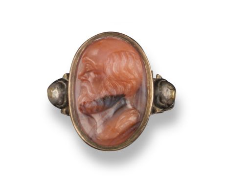 An early 18th century rhodonite cameo ring, depicting a bearded figure (probably Socrates), the ring mount with lobed under s