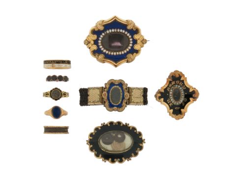 A mixed group of antique mourning jewellery, including three gold mourning rings, a lapiz lazuli signet ring, a George III ga