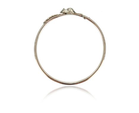 A silver bangle by Sarah Jones, set with a fieldmouse on a wheatsheaf in silver, maker's mark and London hallmarks for 1982, 
