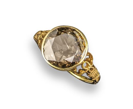 A fancy-coloured diamond ring, the old circular-cut brown diamond weighs approximately 1.45cts in carved yellow gold shank, s