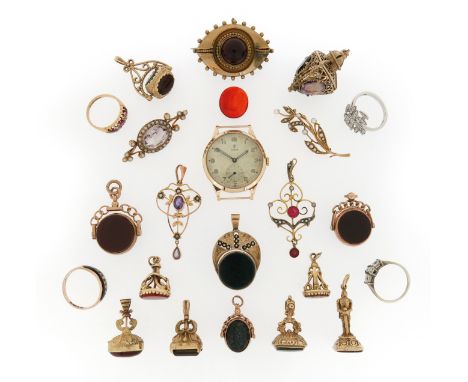 A mixed group of jewellery including eleven gold fob seals, a Victorian garnet-set gold brooch, a gold Tudor watch, two seed 