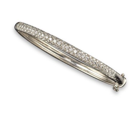 A diamond-set white gold bangle, the upper section pave-set with circular-cut diamonds, 6cm internal diameter