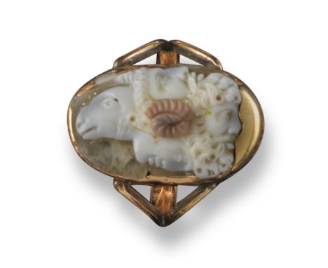 A late 18th - early 19th century gold ring mounted with an oval hardstone Gryllus cameo, depicting the conjoined heads of two
