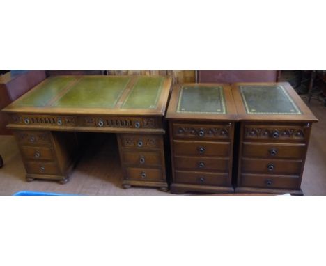 An "Old Charm" Office Suite, comprising tooled green leather surface twin pedestal desk. approx 138 x 76 x 79 cms, two long d