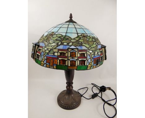 A Tiffany-Style Table Lamp, with cottages in relief, approx 58 cms