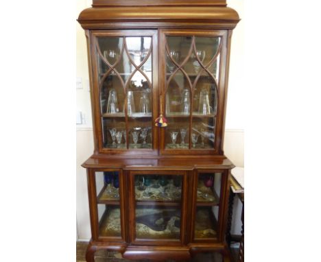 An Edwardian Inlaid Mahogany Display Cabinet, the top with two astral glazed doors, cupboard beneath having one shelf raised 